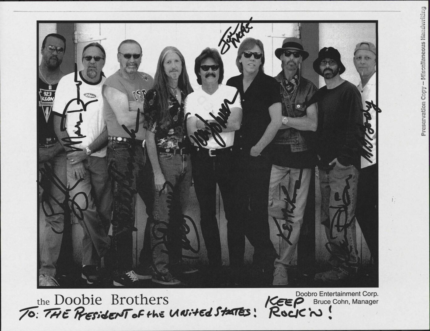 Signed photo to President George W. Bush from The Doobie Brothers